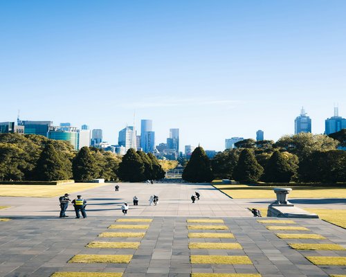 People walking calmly in a scenic urban park
